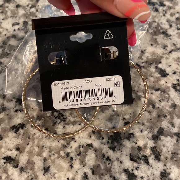These Anne Klein medium size hoop earrings are gold and very light weight! - Picture 2 of 2